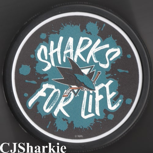 Slogan Logo Puck front view